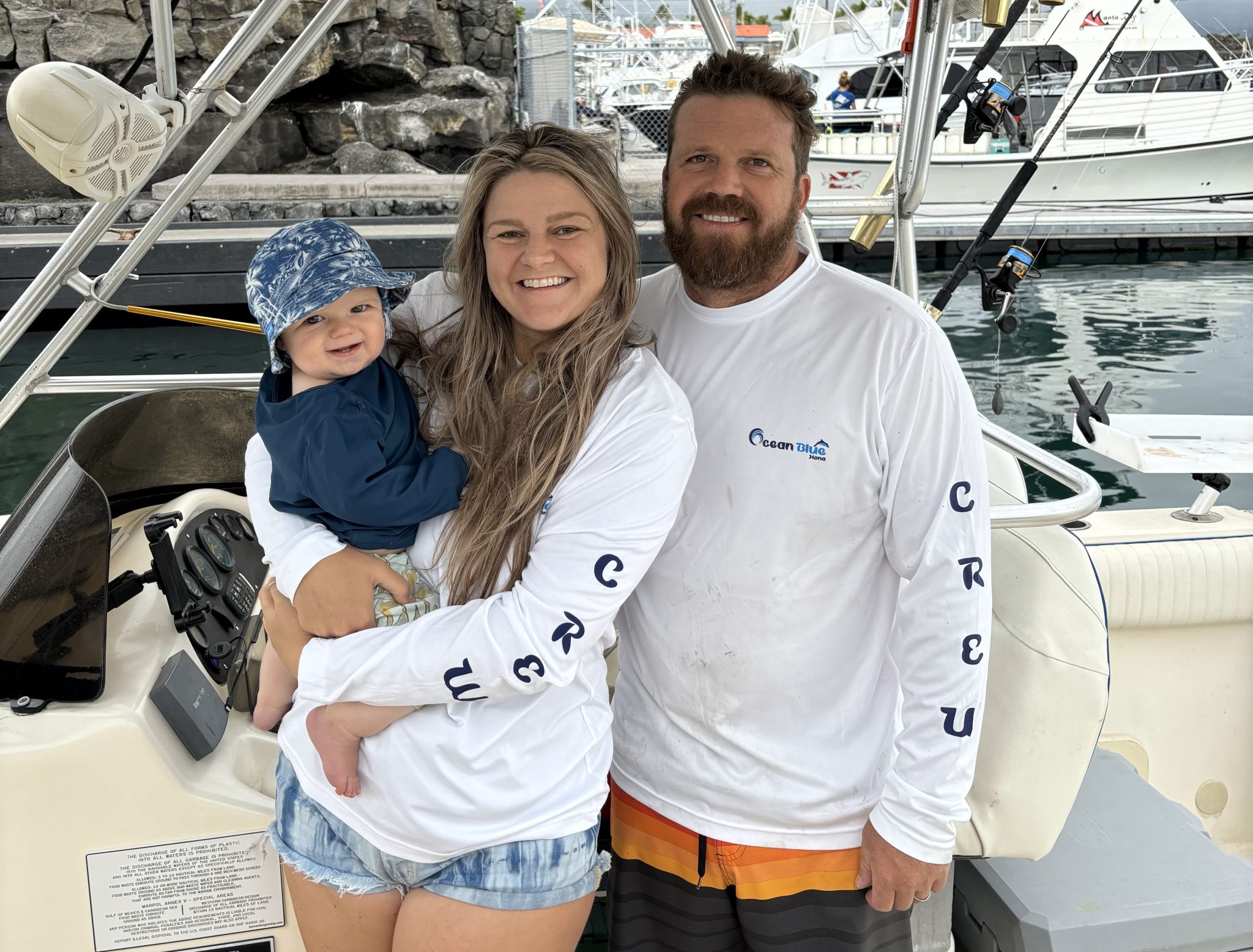 Kevin, Tasha, and baby Kade on their boat